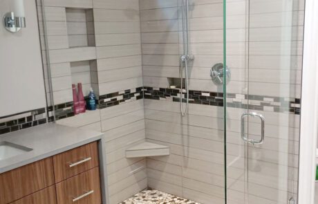 Master Bathroom Remodel with Contrasting Shower Tiling